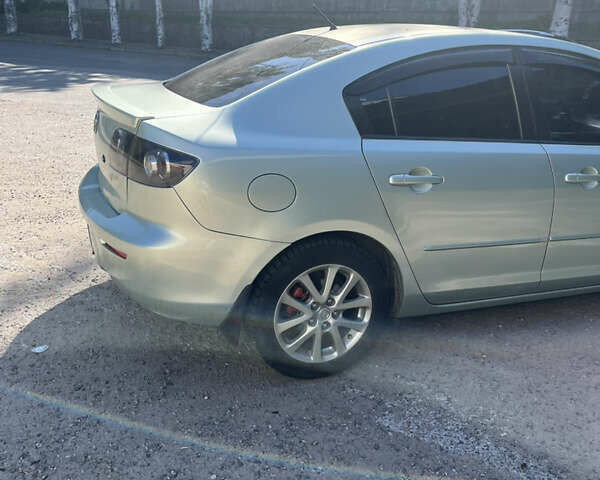 Зелений Мазда 3, об'ємом двигуна 1.6 л та пробігом 275 тис. км за 6200 $, фото 35 на Automoto.ua