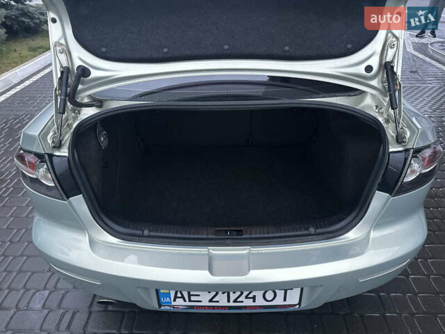 Зеленый Мазда 3, объемом двигателя 1.6 л и пробегом 238 тыс. км за 5200 $, фото 6 на Automoto.ua