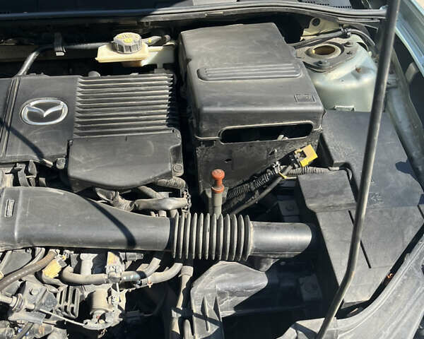 Зелений Мазда 3, об'ємом двигуна 1.6 л та пробігом 275 тис. км за 6200 $, фото 12 на Automoto.ua