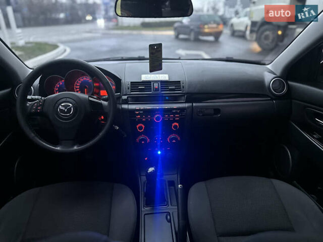 Зеленый Мазда 3, объемом двигателя 1.6 л и пробегом 238 тыс. км за 5200 $, фото 8 на Automoto.ua