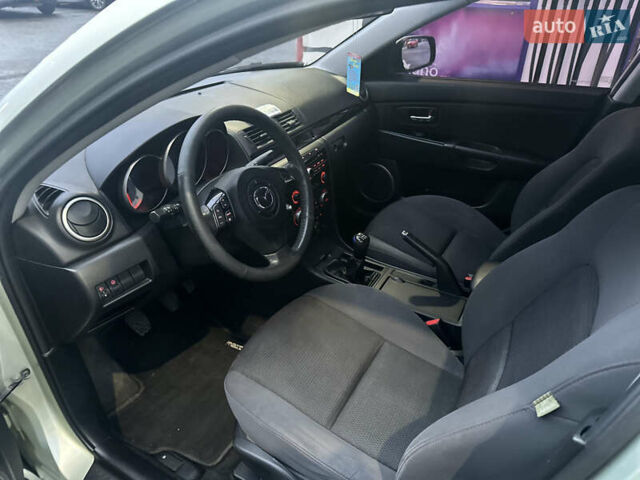 Зеленый Мазда 3, объемом двигателя 1.6 л и пробегом 238 тыс. км за 5200 $, фото 9 на Automoto.ua