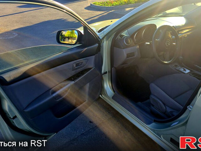 Зелений Мазда 3, об'ємом двигуна 1.6 л та пробігом 148 тис. км за 6000 $, фото 6 на Automoto.ua