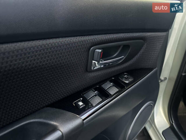 Зеленый Мазда 3, объемом двигателя 1.6 л и пробегом 238 тыс. км за 5200 $, фото 10 на Automoto.ua