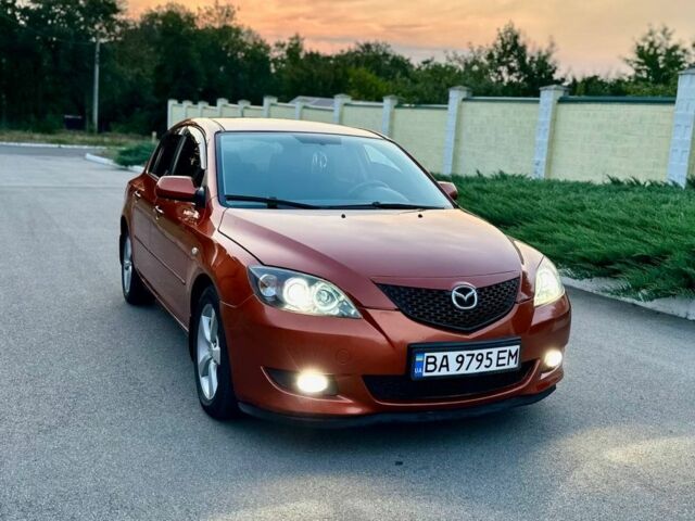 Оранжевый Мазда 3, объемом двигателя 1.6 л и пробегом 200 тыс. км за 4800 $, фото 5 на Automoto.ua