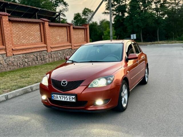 Оранжевый Мазда 3, объемом двигателя 1.6 л и пробегом 200 тыс. км за 4800 $, фото 13 на Automoto.ua