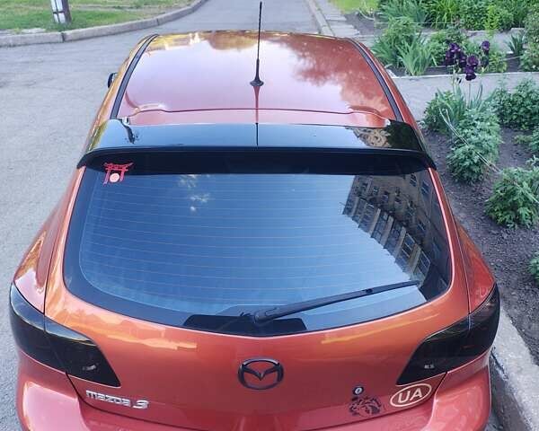 Оранжевый Мазда 3, объемом двигателя 1.6 л и пробегом 253 тыс. км за 5700 $, фото 3 на Automoto.ua