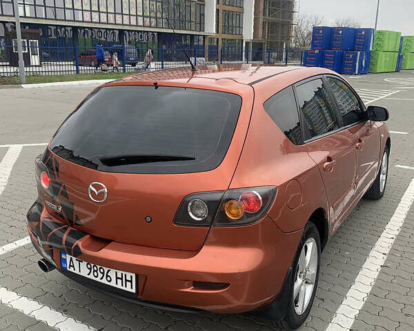 Оранжевый Мазда 3, объемом двигателя 1.6 л и пробегом 235 тыс. км за 3200 $, фото 1 на Automoto.ua
