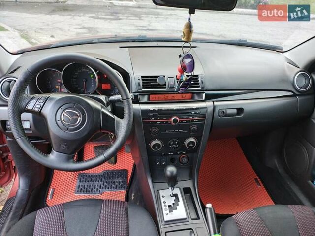 Оранжевый Мазда 3, объемом двигателя 1.6 л и пробегом 253 тыс. км за 5700 $, фото 9 на Automoto.ua