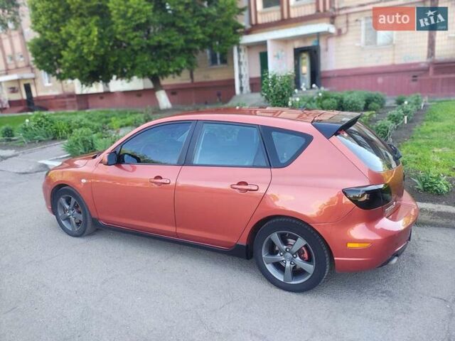 Оранжевый Мазда 3, объемом двигателя 1.6 л и пробегом 253 тыс. км за 5700 $, фото 6 на Automoto.ua