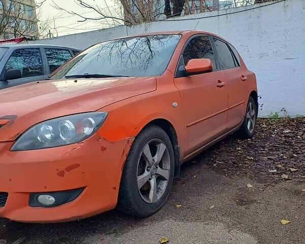 Оранжевый Мазда 3, объемом двигателя 1.6 л и пробегом 351 тыс. км за 3800 $, фото 5 на Automoto.ua
