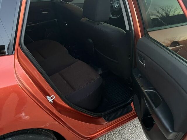 Оранжевый Мазда 3, объемом двигателя 1.6 л и пробегом 181 тыс. км за 4600 $, фото 12 на Automoto.ua