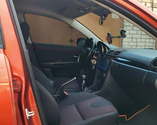 Мазда 3 2005 в Днепре (Днепропетровске) на Automoto.ua Оранжевый Мазда 3, объемом двигателя 1.6 л и пробегом 147 тыс. км за 5000 $, фото 8 на Automoto.ua