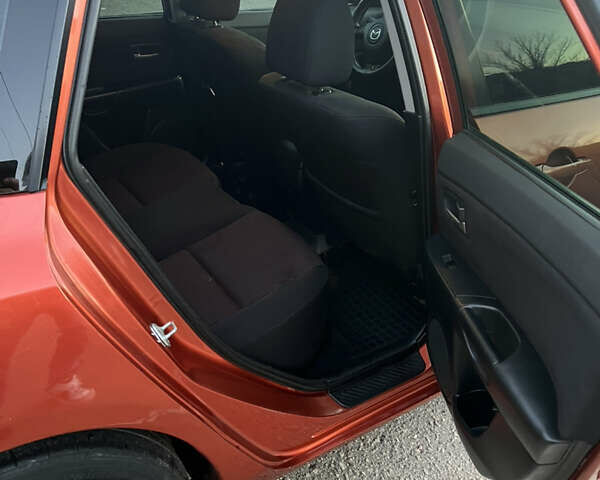Оранжевый Мазда 3, объемом двигателя 1.6 л и пробегом 181 тыс. км за 4600 $, фото 12 на Automoto.ua
