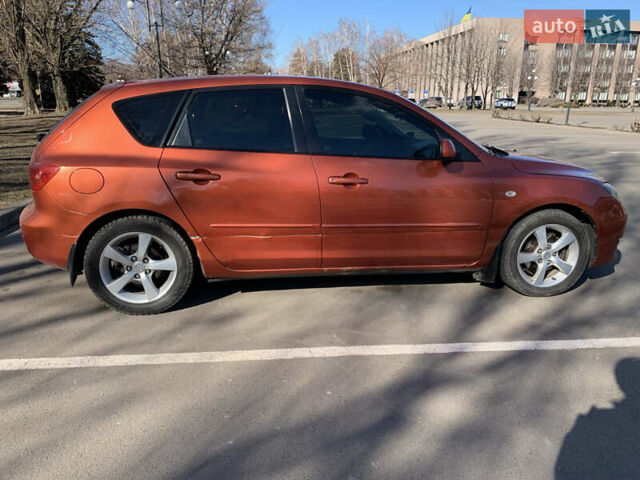 Помаранчевий Мазда 3, об'ємом двигуна 1.6 л та пробігом 179 тис. км за 3200 $, фото 4 на Automoto.ua