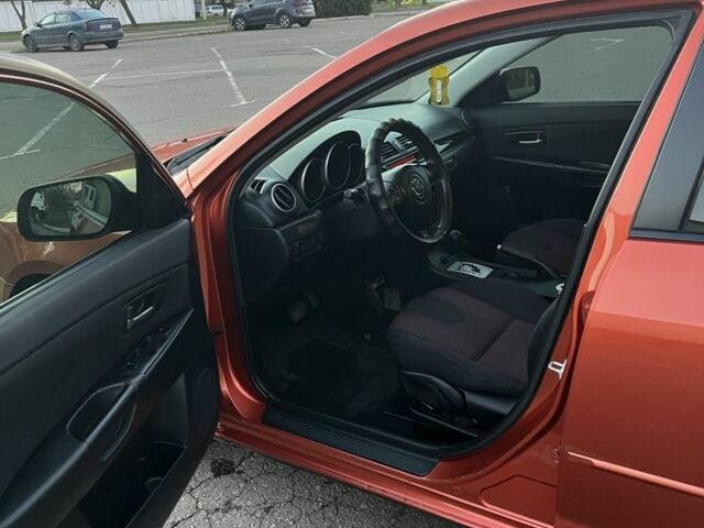 Оранжевый Мазда 3, объемом двигателя 1.6 л и пробегом 181 тыс. км за 4600 $, фото 6 на Automoto.ua