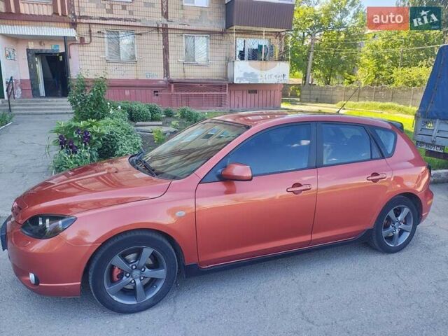 Оранжевый Мазда 3, объемом двигателя 1.6 л и пробегом 253 тыс. км за 5700 $, фото 1 на Automoto.ua
