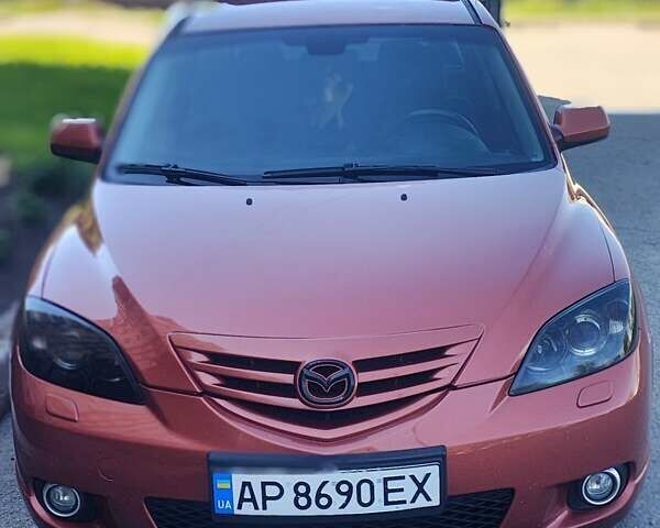 Оранжевый Мазда 3, объемом двигателя 1.6 л и пробегом 253 тыс. км за 5700 $, фото 4 на Automoto.ua