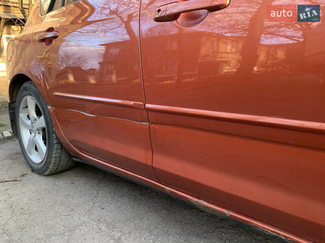 Помаранчевий Мазда 3, об'ємом двигуна 1.6 л та пробігом 179 тис. км за 3200 $, фото 10 на Automoto.ua