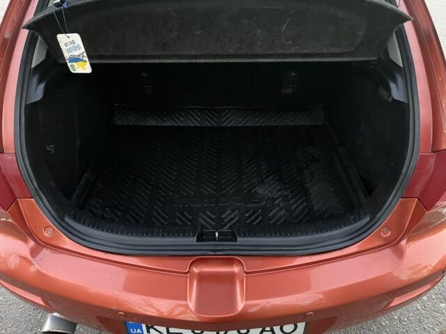 Оранжевый Мазда 3, объемом двигателя 1.6 л и пробегом 181 тыс. км за 4600 $, фото 14 на Automoto.ua