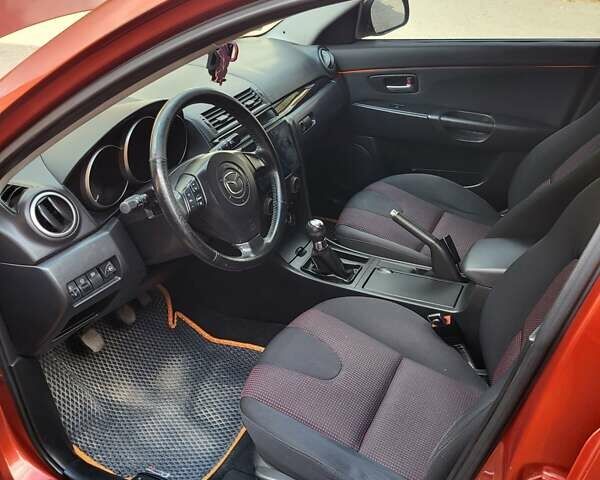 Мазда 3 2005 в Днепре (Днепропетровске) на Automoto.ua Оранжевый Мазда 3, объемом двигателя 1.6 л и пробегом 147 тыс. км за 5000 $, фото 4 на Automoto.ua