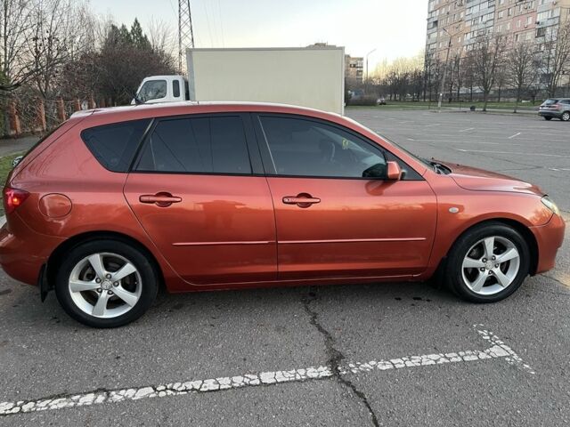 Оранжевый Мазда 3, объемом двигателя 1.6 л и пробегом 181 тыс. км за 4600 $, фото 3 на Automoto.ua