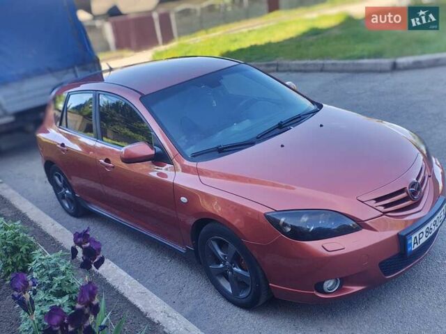 Оранжевый Мазда 3, объемом двигателя 1.6 л и пробегом 253 тыс. км за 5700 $, фото 7 на Automoto.ua