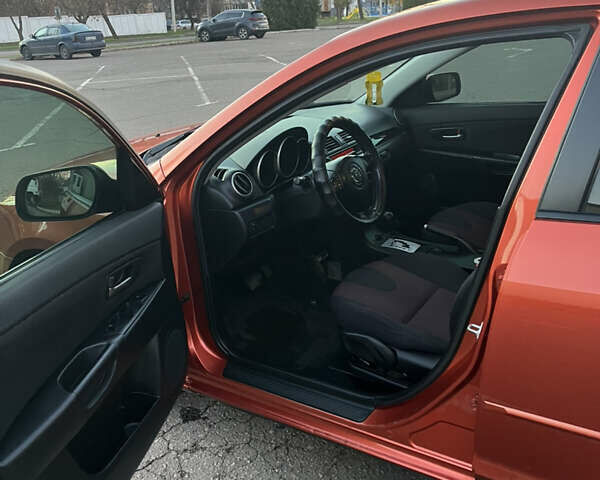 Оранжевый Мазда 3, объемом двигателя 1.6 л и пробегом 181 тыс. км за 4600 $, фото 6 на Automoto.ua