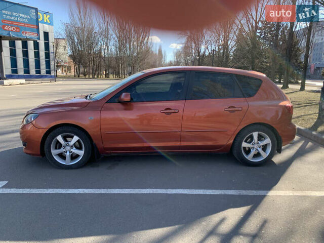 Помаранчевий Мазда 3, об'ємом двигуна 1.6 л та пробігом 179 тис. км за 3200 $, фото 9 на Automoto.ua
