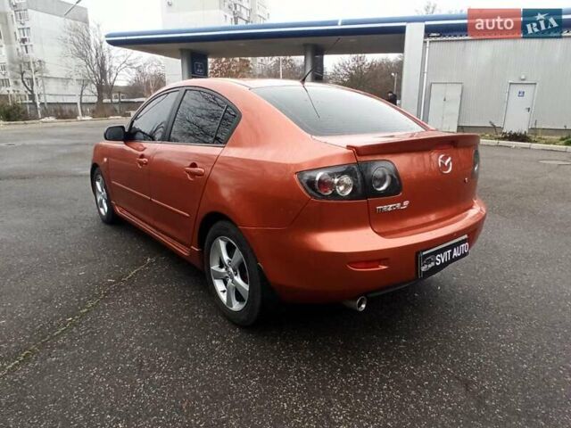 Оранжевый Мазда 3, объемом двигателя 1.6 л и пробегом 212 тыс. км за 5700 $, фото 6 на Automoto.ua