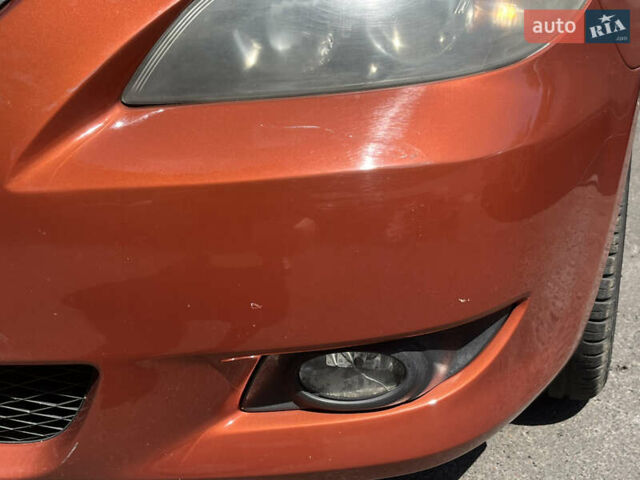 Оранжевый Мазда 3, объемом двигателя 1.6 л и пробегом 265 тыс. км за 4800 $, фото 1 на Automoto.ua