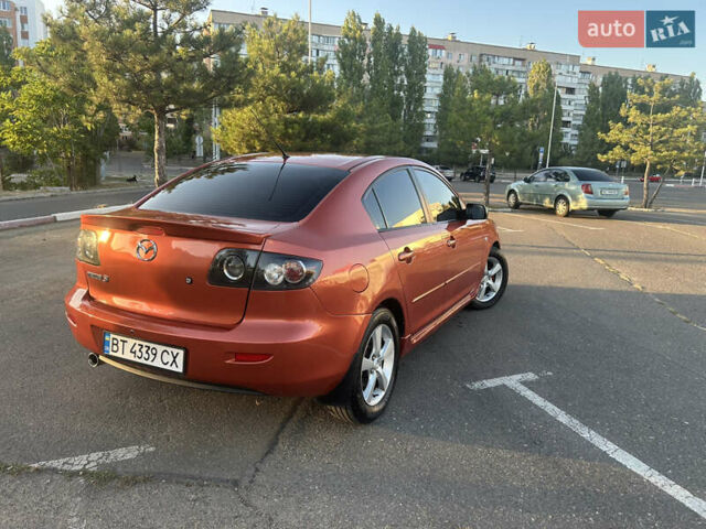 Помаранчевий Мазда 3, об'ємом двигуна 1.6 л та пробігом 211 тис. км за 5700 $, фото 3 на Automoto.ua
