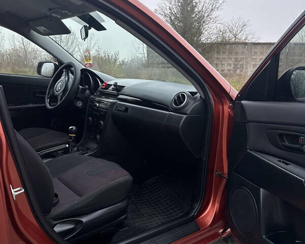 Оранжевый Мазда 3, объемом двигателя 1.6 л и пробегом 260 тыс. км за 4500 $, фото 3 на Automoto.ua