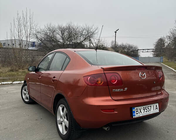 Оранжевый Мазда 3, объемом двигателя 1.6 л и пробегом 260 тыс. км за 4500 $, фото 6 на Automoto.ua