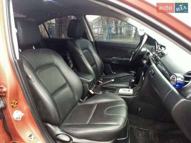 Оранжевый Мазда 3, объемом двигателя 1.6 л и пробегом 212 тыс. км за 5700 $, фото 13 на Automoto.ua