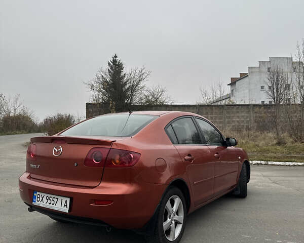 Оранжевый Мазда 3, объемом двигателя 1.6 л и пробегом 260 тыс. км за 4500 $, фото 7 на Automoto.ua