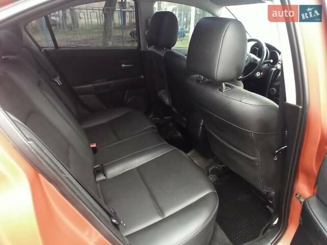 Оранжевый Мазда 3, объемом двигателя 1.6 л и пробегом 212 тыс. км за 5700 $, фото 11 на Automoto.ua