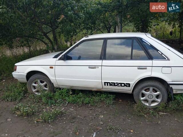 Білий Мазда 323, об'ємом двигуна 0 л та пробігом 300 тис. км за 800 $, фото 4 на Automoto.ua