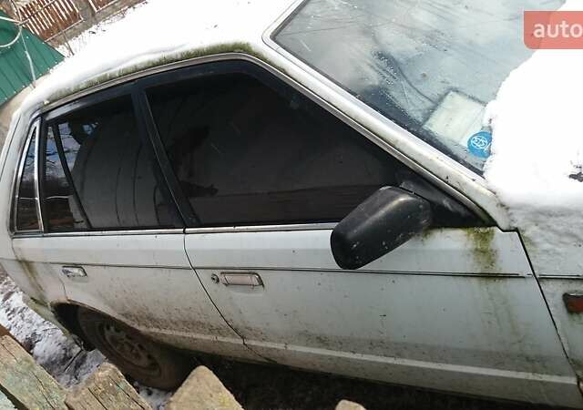 Белый Мазда 323, объемом двигателя 1.5 л и пробегом 333 тыс. км за 300 $, фото 14 на Automoto.ua