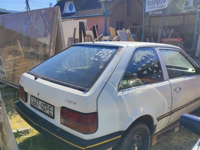 Белый Мазда 323, объемом двигателя 1.7 л и пробегом 500 тыс. км за 214 $, фото 3 на Automoto.ua