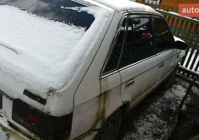 Белый Мазда 323, объемом двигателя 1.5 л и пробегом 333 тыс. км за 300 $, фото 18 на Automoto.ua