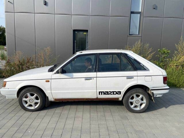 Білий Мазда 323, об'ємом двигуна 1.5 л та пробігом 230 тис. км за 849 $, фото 4 на Automoto.ua