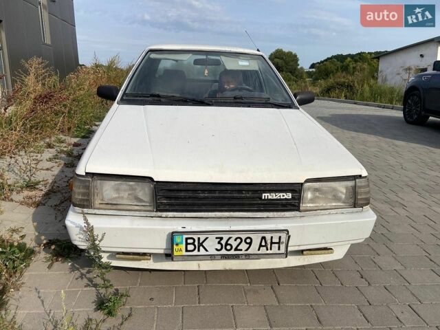 Білий Мазда 323, об'ємом двигуна 1.5 л та пробігом 230 тис. км за 849 $, фото 1 на Automoto.ua