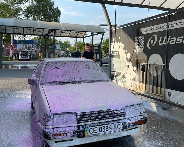 Белый Мазда 323, объемом двигателя 1.3 л и пробегом 300 тыс. км за 1000 $, фото 2 на Automoto.ua