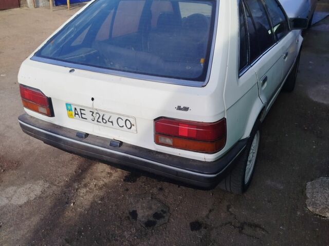 Белый Мазда 323, объемом двигателя 1.5 л и пробегом 4 тыс. км за 600 $, фото 3 на Automoto.ua