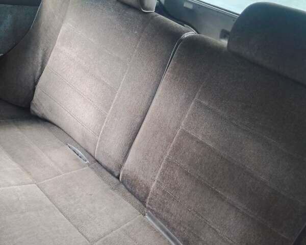 Белый Мазда 323, объемом двигателя 1 л и пробегом 250 тыс. км за 600 $, фото 6 на Automoto.ua