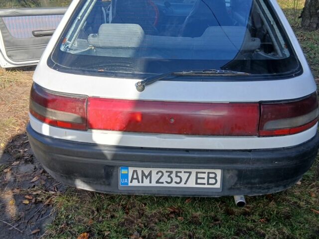 Білий Мазда 323, об'ємом двигуна 1.3 л та пробігом 500 тис. км за 715 $, фото 10 на Automoto.ua
