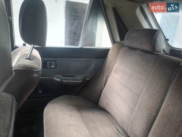 Белый Мазда 323, объемом двигателя 1 л и пробегом 250 тыс. км за 600 $, фото 8 на Automoto.ua