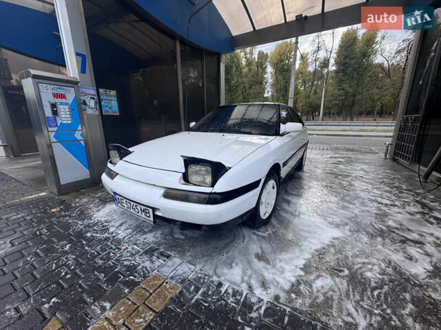 Білий Мазда 323, об'ємом двигуна 1.6 л та пробігом 199 тис. км за 1999 $, фото 1 на Automoto.ua