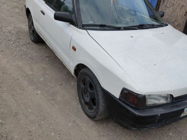 Белый Мазда 323, объемом двигателя 0 л и пробегом 480 тыс. км за 500 $, фото 2 на Automoto.ua