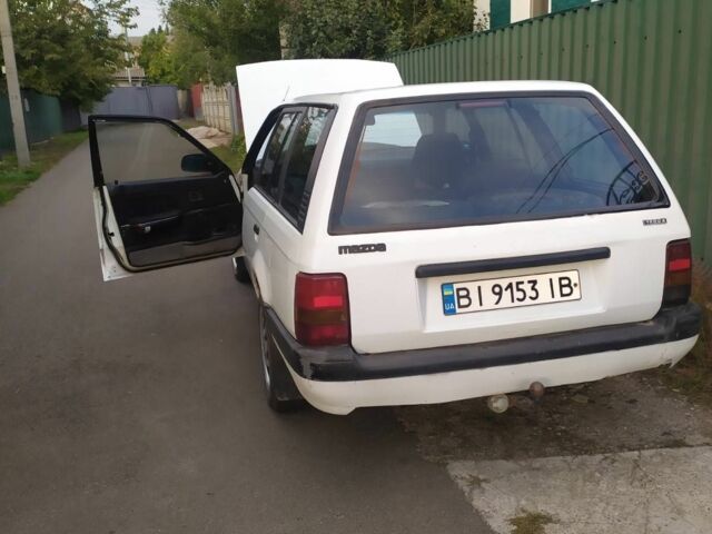 Білий Мазда 323, об'ємом двигуна 1.5 л та пробігом 20 тис. км за 1187 $, фото 1 на Automoto.ua